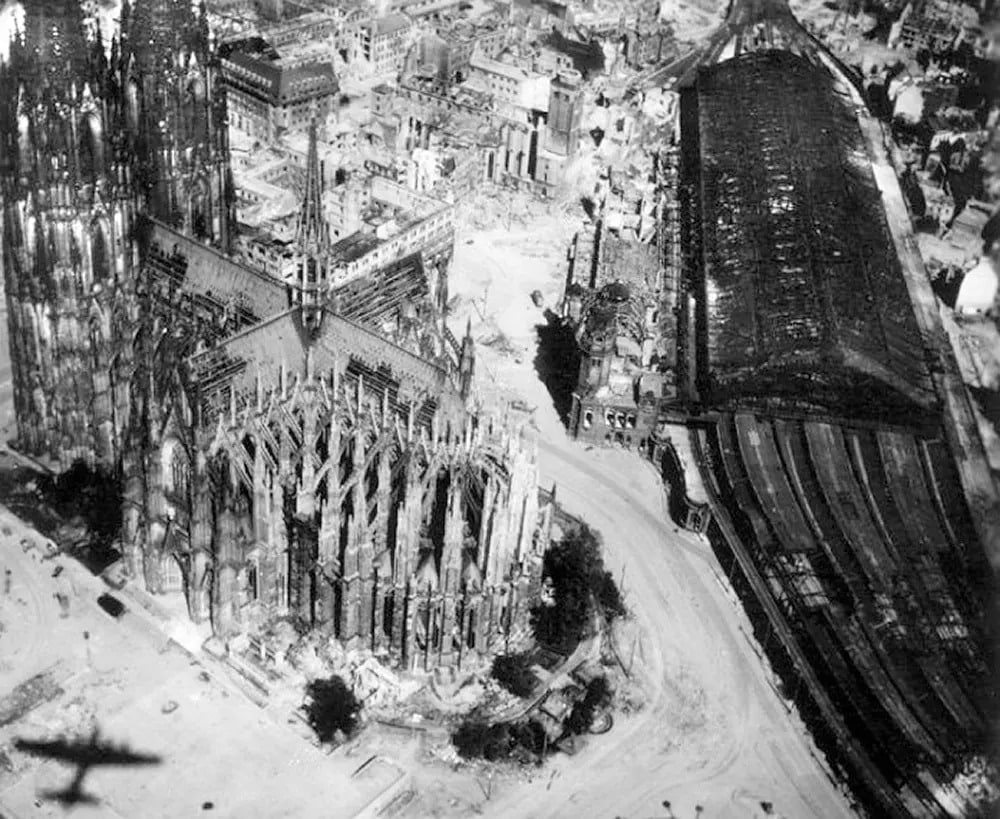 Image of the cathedral. Notice the shadow of the bomber.