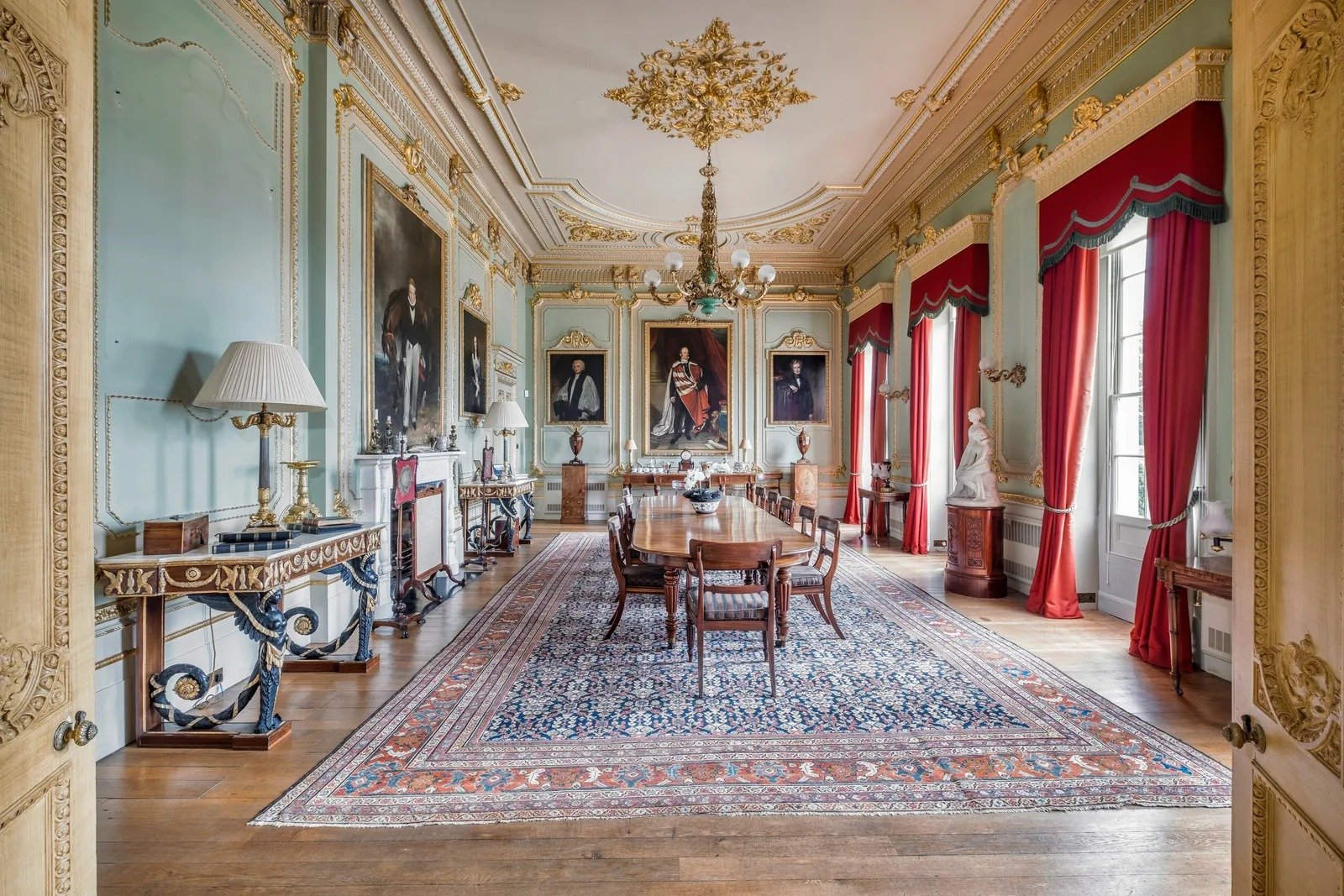 The dining room, where portraits of former residents the cornwallies family hang