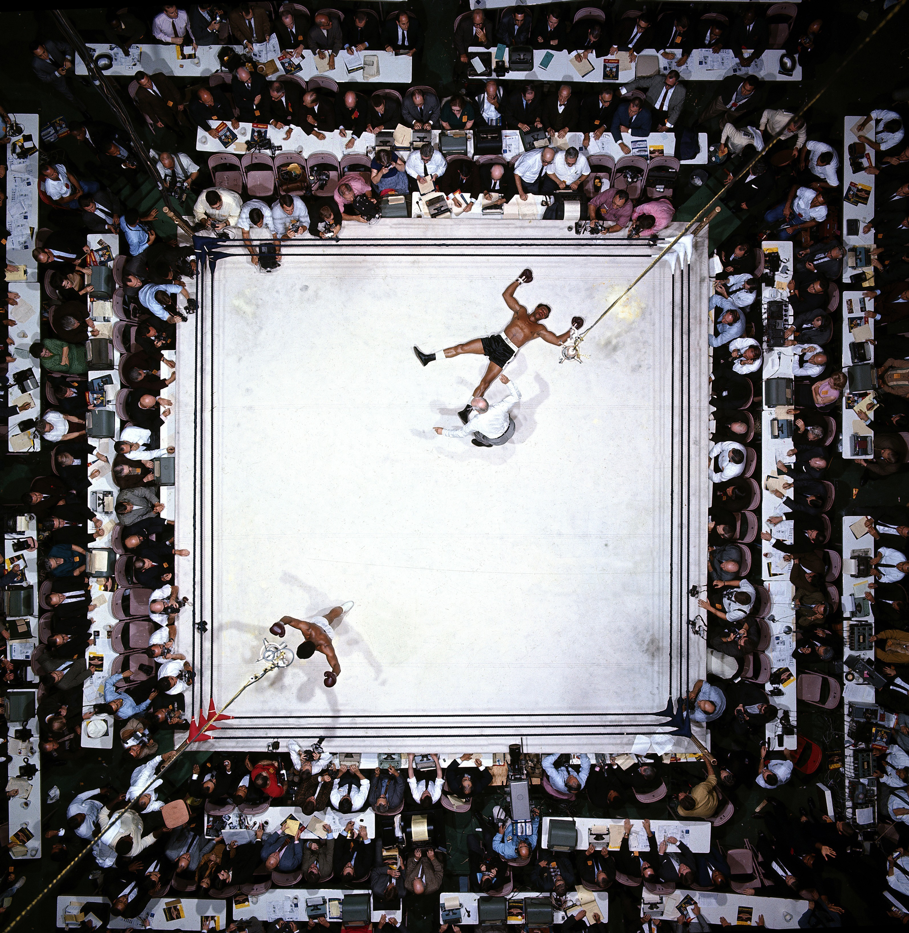  Aerial view of Muhammad Ali victorious after round three knockout of Cleveland Williams during fight at Astrodome