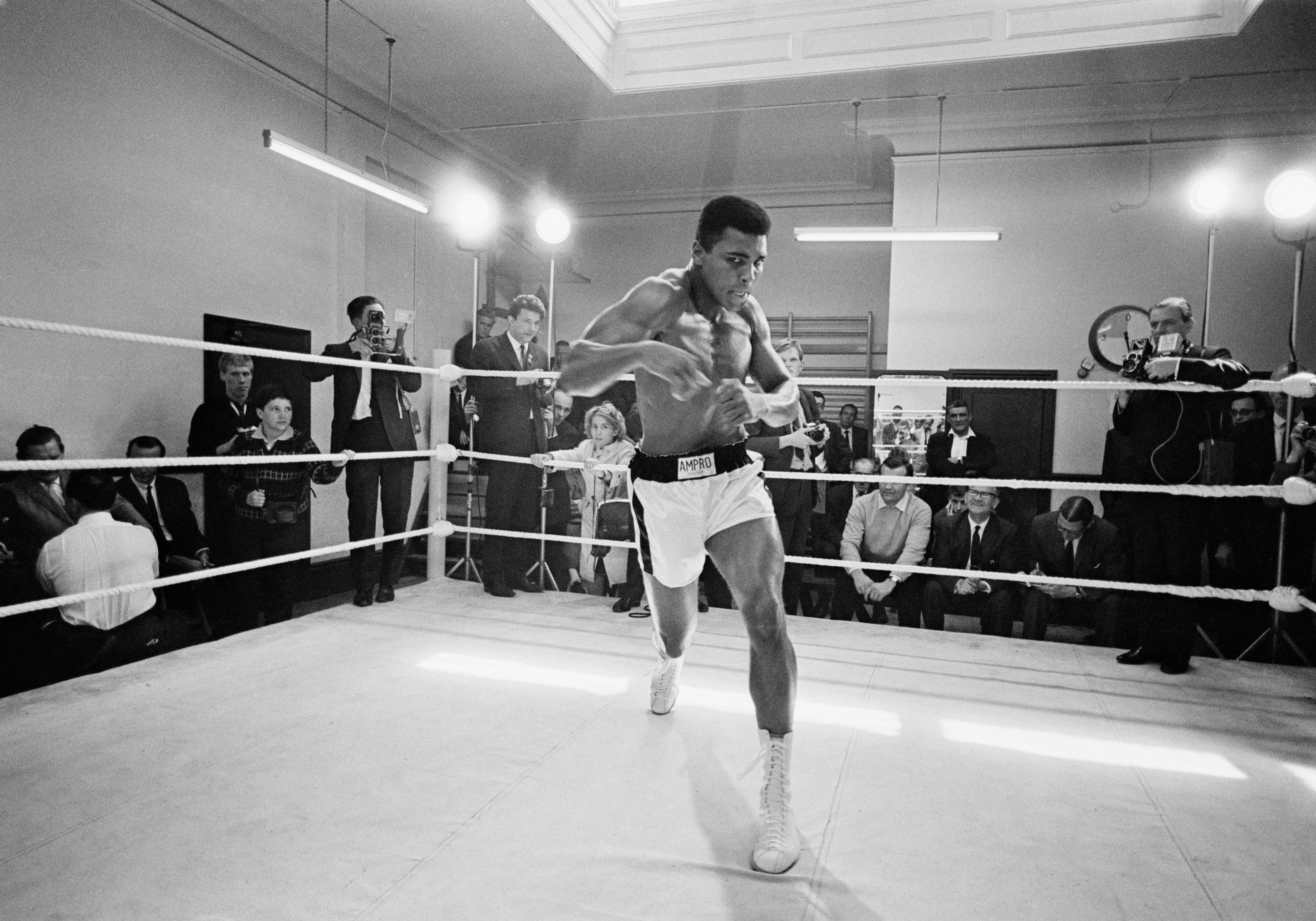  The heavyweight boxer throws bare-handed punches in the ring while in training for his fight against Brian London in London, 1966