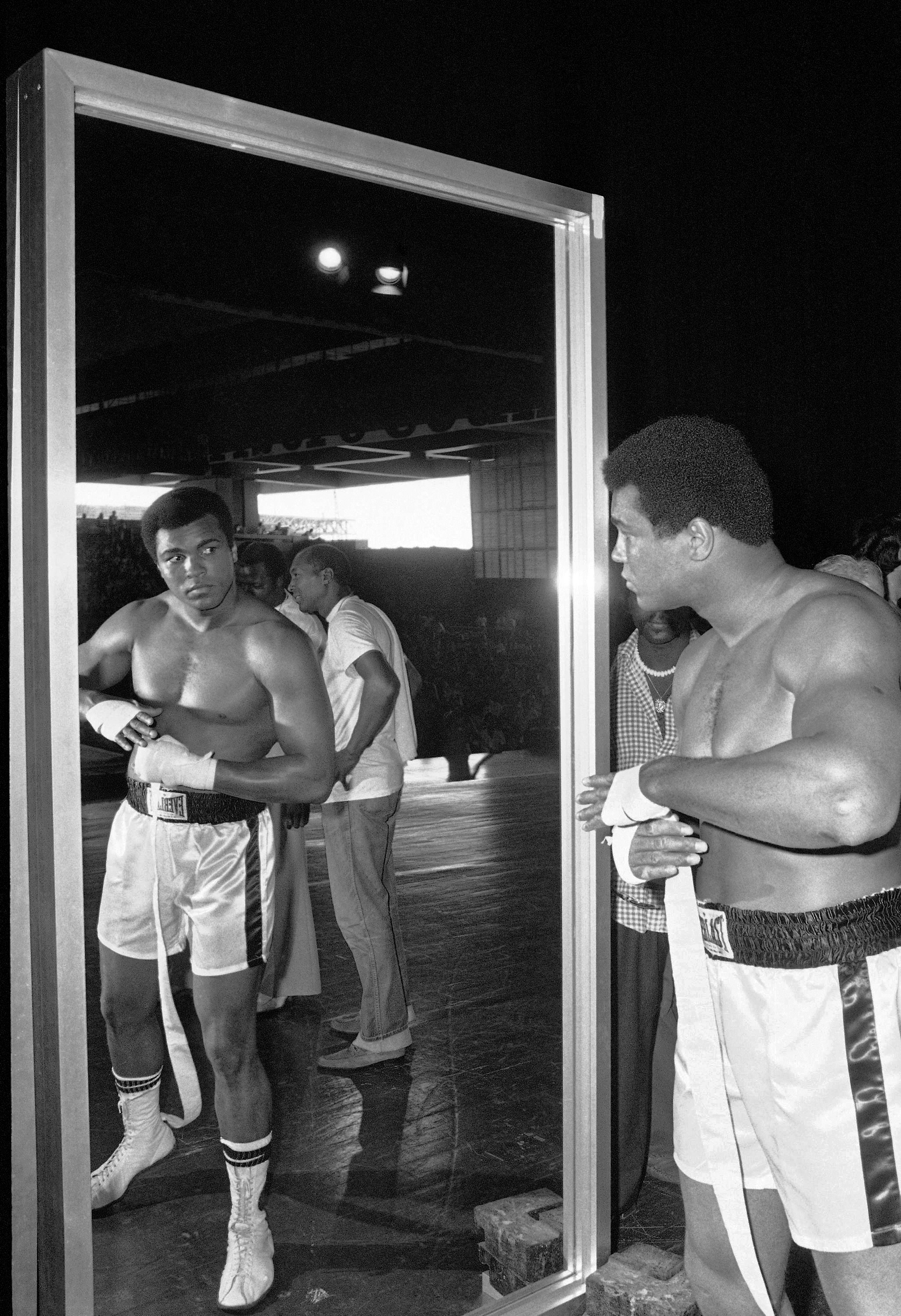  Checking himself out in a mirror during a training session in Manila, Philippines