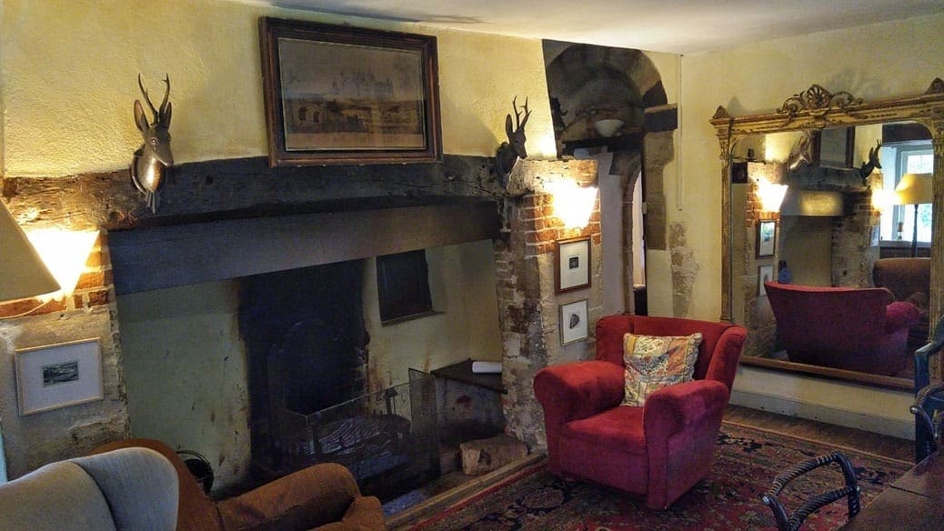 The old fireplace in the dining room where Granny Oldknow sat, stitched and told her stories