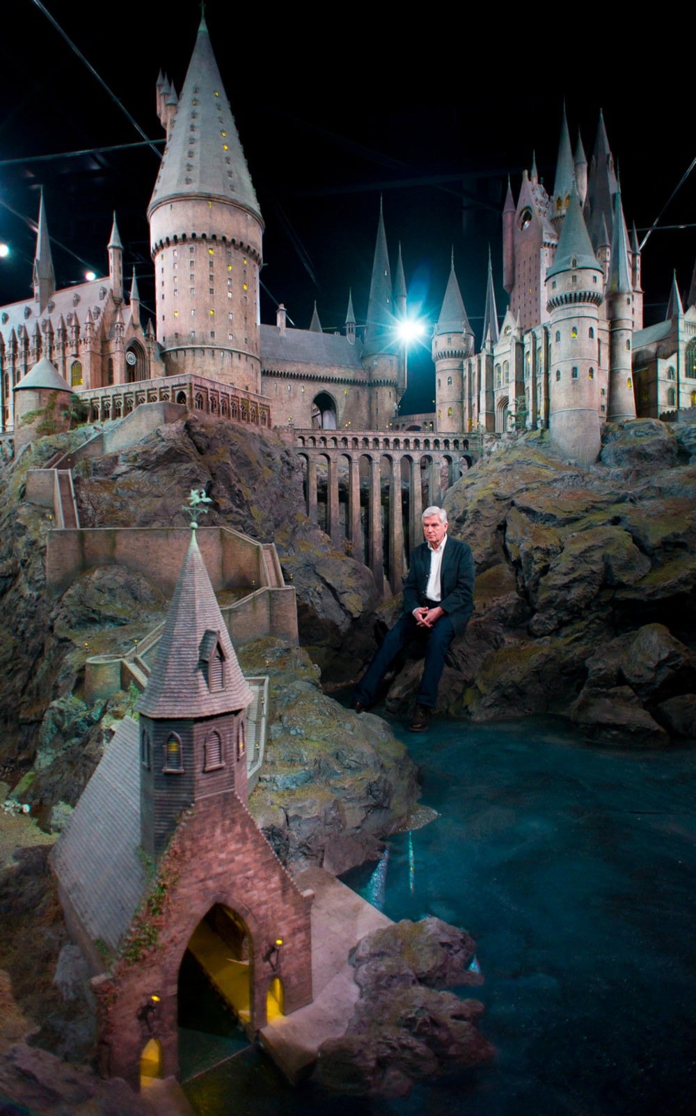 Stuart Craig, production manager, unveils a model of Hogwarts castle at the Warner Bros Studio Tour, Watford, London, Thursday, March 1, 2012.