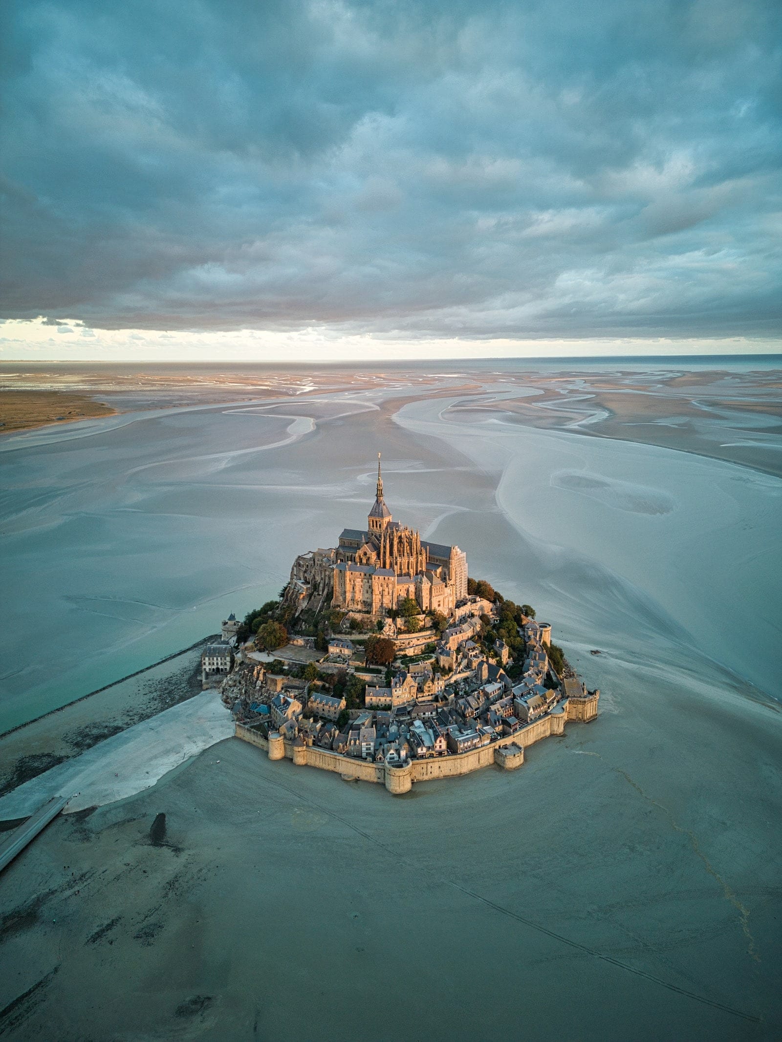 View at sunrise of the bay of Mont Saint Michel, Normandy, France