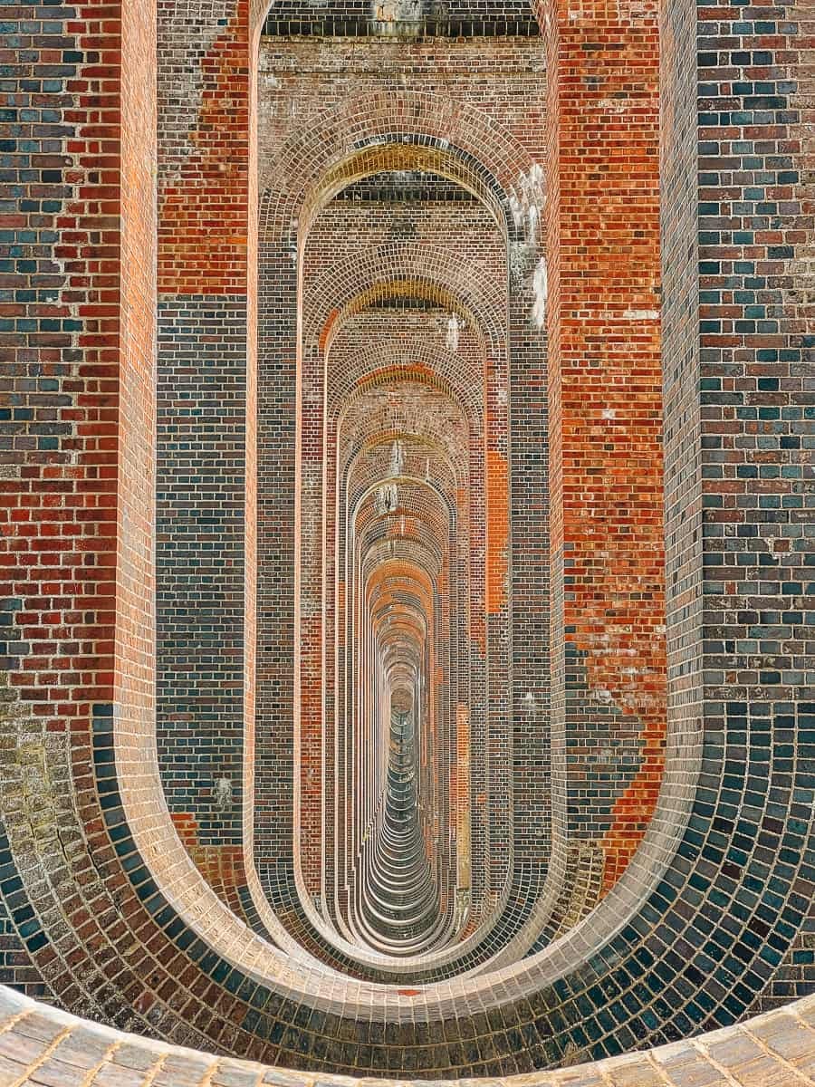 The arched vaulting supporting brick piers