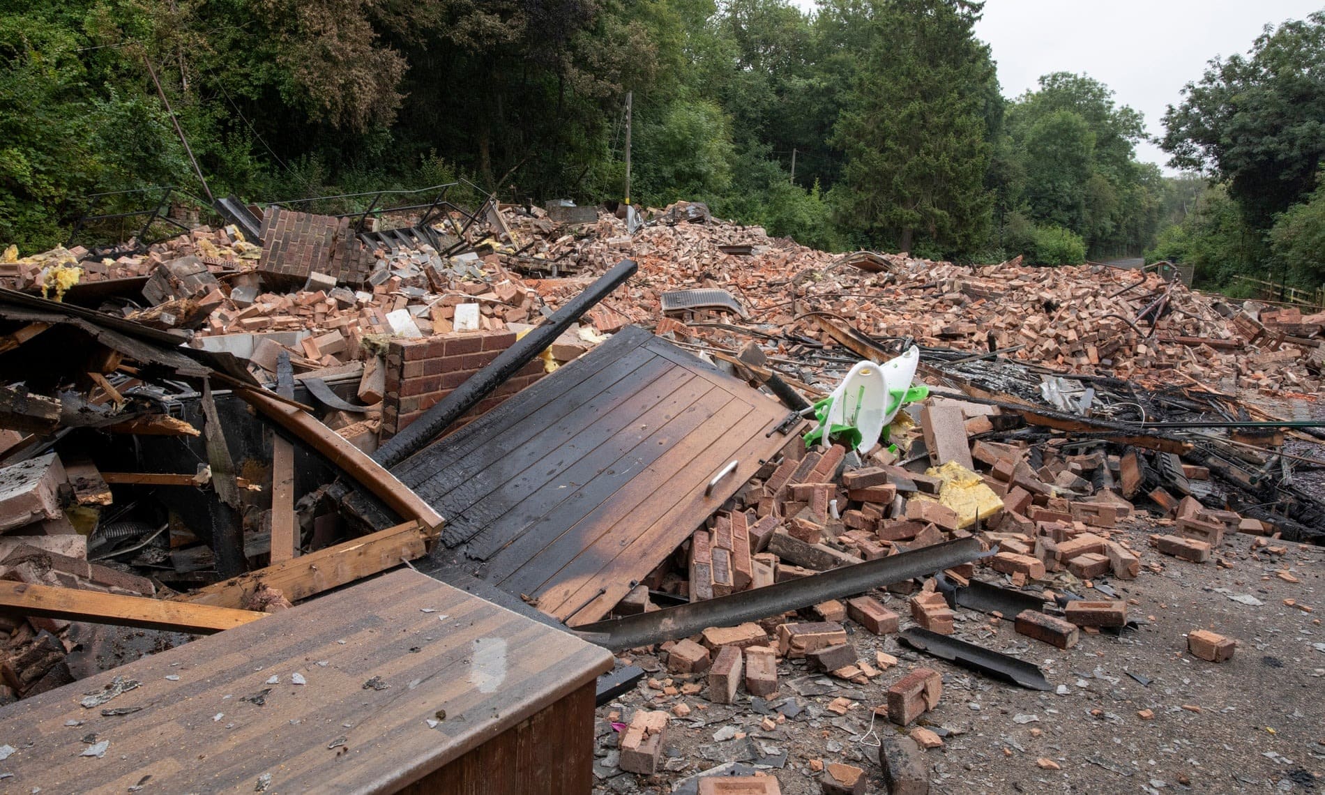 The remains of the 260-year-old Crooked House pub in Himley, Staffordshire after the fire and it being knocked down