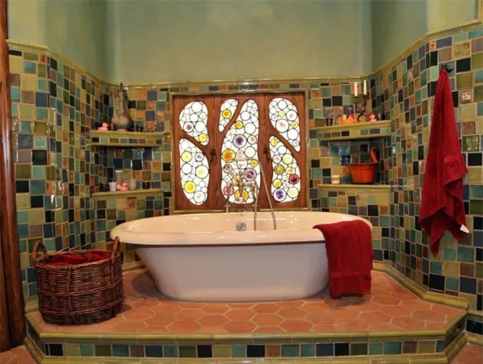 The master bathroom with stained glass provided by James Thomas Stained & Leaded Glass