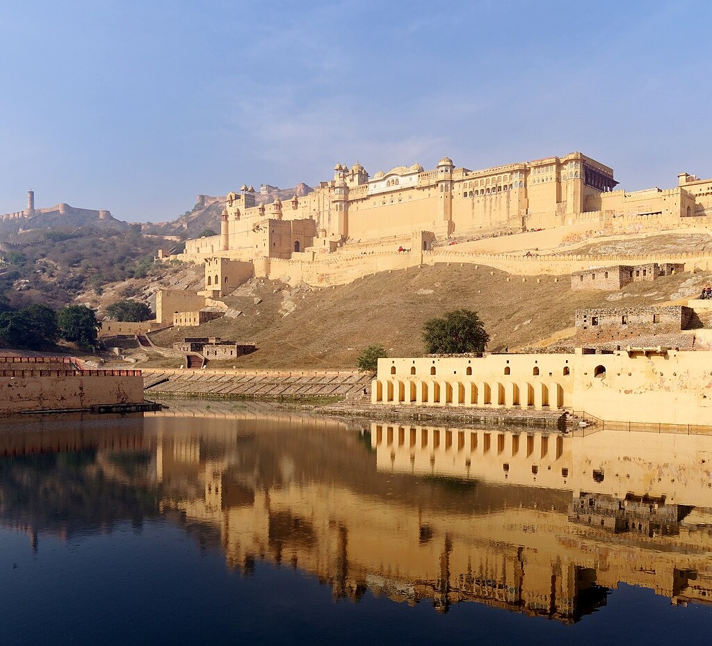 Amber Fort seen from the bank of Maotha Lake, Jaigarh Fort on the hills in the background