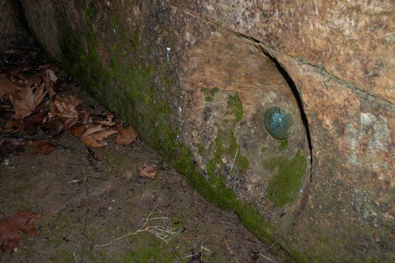 The bronze outflow valve at the bottom of the klepsydra reservoir