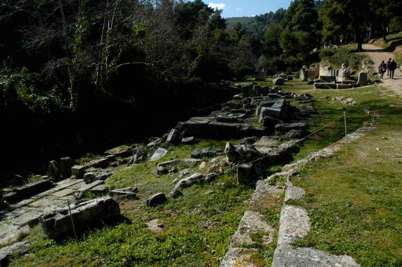 View SW across altar, theatral area, sacred spring, and temple