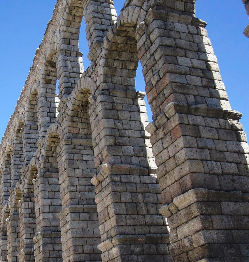 Close up on detail, Roman Aqueduct of Segovia displaying the carved stone blocks in much detail