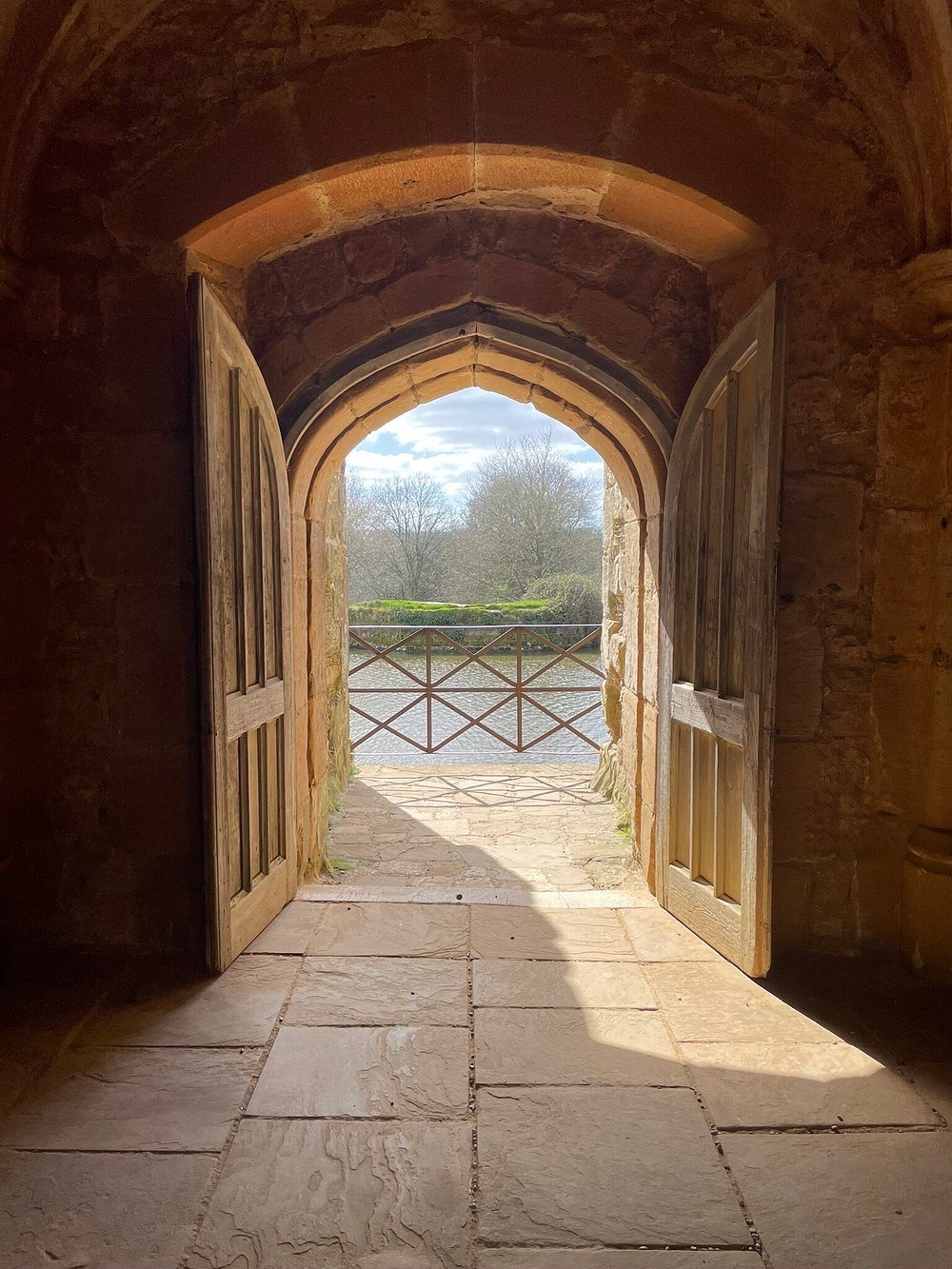 This is a view looking out of the Postern gate at the back of the castle – looking across the castle moat.