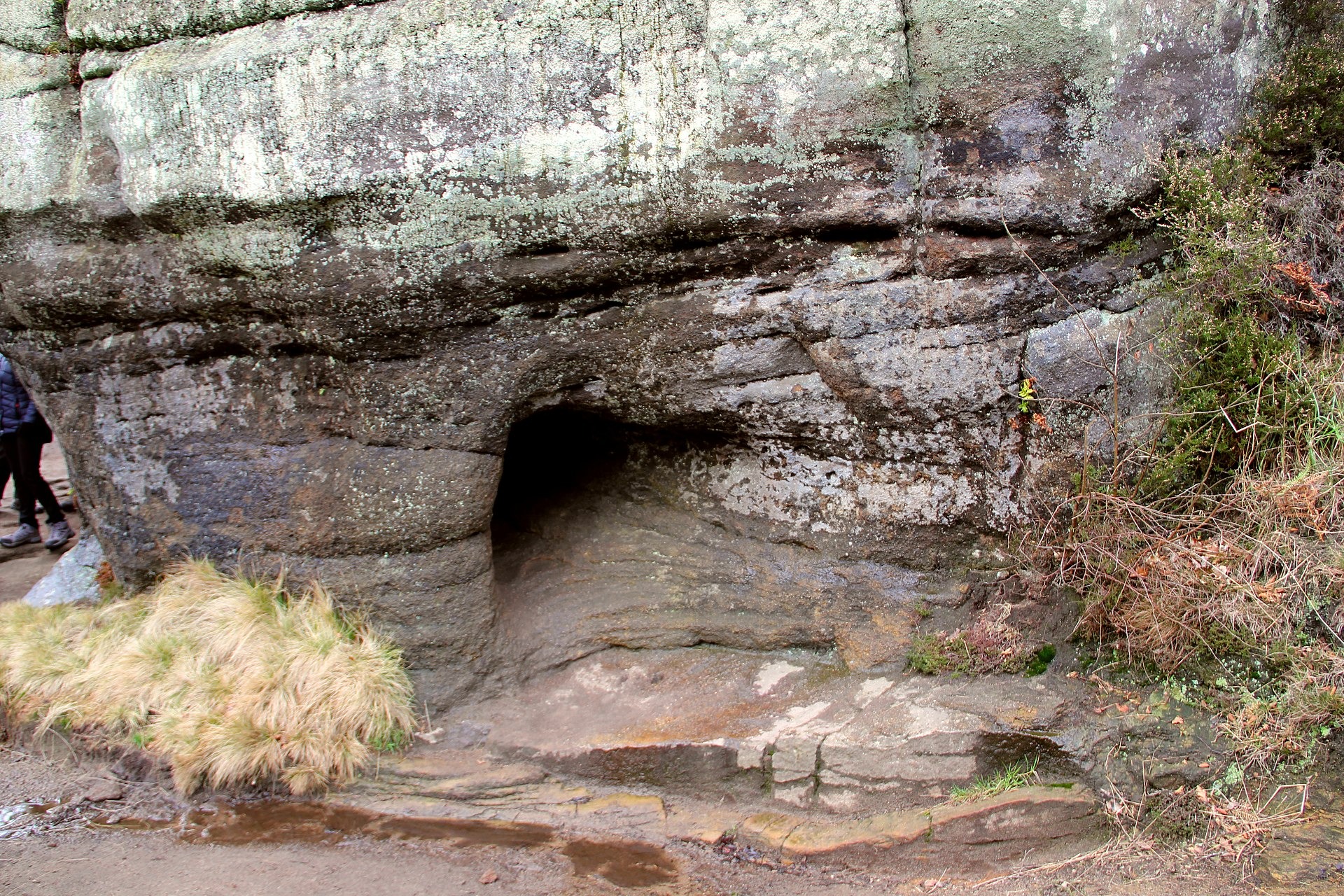 Perforated rock, once thought to be an oracular stone (now called Smartie Tube)