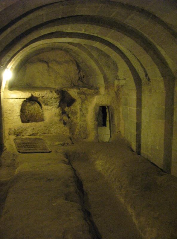 The room with the barrel-vaulted ceiling, possibly a school