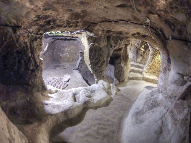 Well-lit interior view of the otherwise dark and gloomy underground city of Derinkuyu