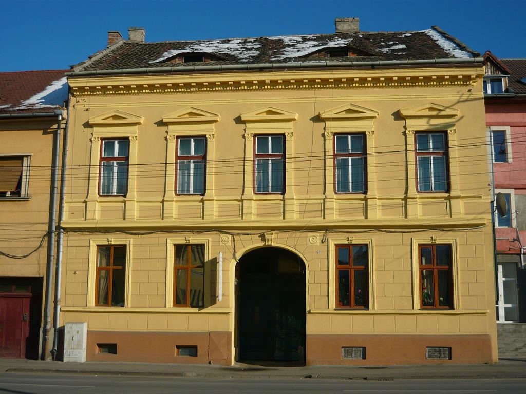 Neoclassical building with eyes (Sibiu)