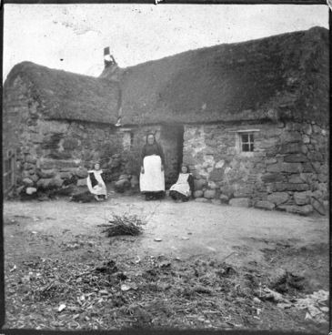 Belle MacDonald outside Leanach Cottage