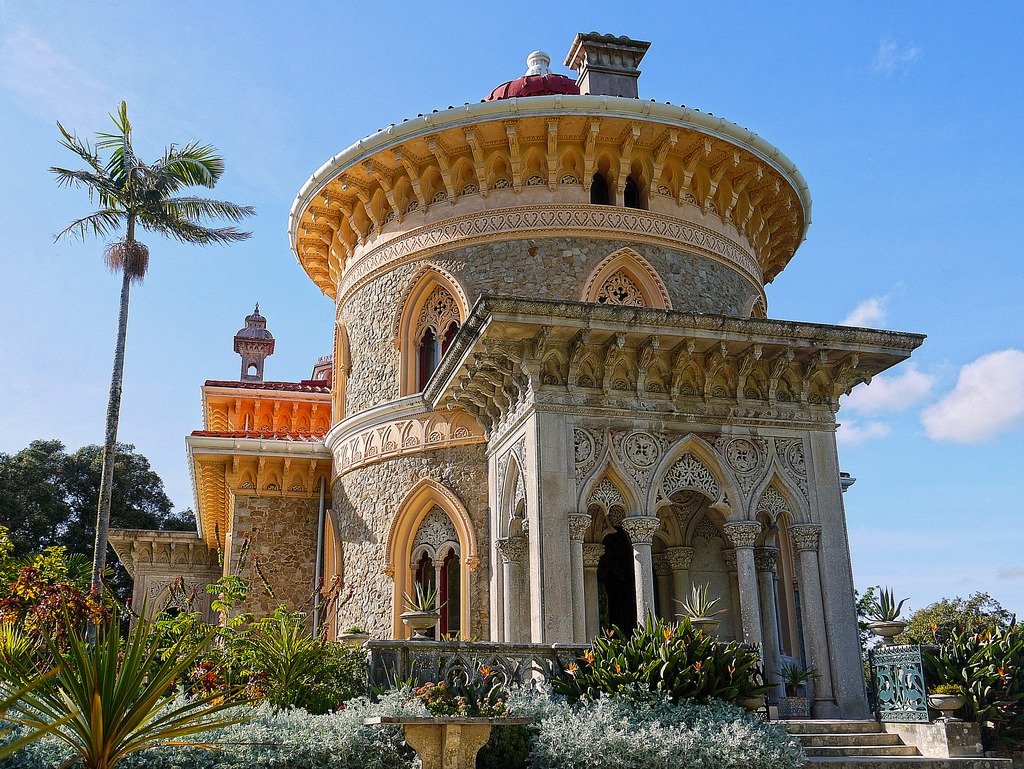 Monserrate is a romantic neo-gothic palace with Moorish inspired details. It is located on a hill near Sintra, Portugal and was originally the site of a 16th century Chapel which was destroyed in the 1755 earthquake. The present palace was built in 1858 for Sir Francis Cook, Viscount of Monserate, and was used as a summer residence. The design of the gardens took advantage of the unique microclimates of the mountain to produce a magnificent park in which over 3,000 exotic species can still be seen today.