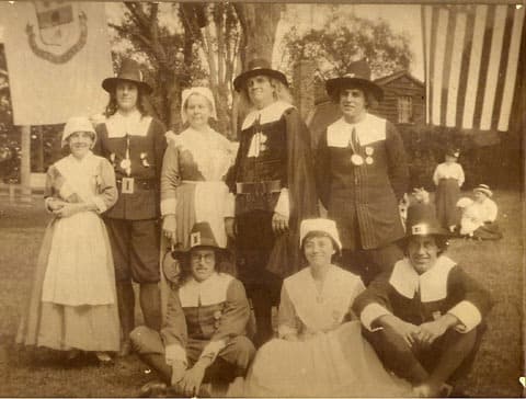 Fairbanks Reunon — A longstanding tradition at Fairbanks Family reunions has been for cousins to dress in Puritan costume in honor of their immigrant ancestors. Included in this 1910s reunion photo are first Fairbanks House Curator Henry Irving Fairbanks (standing fourth from left) and his wife, Ida (standing far left).