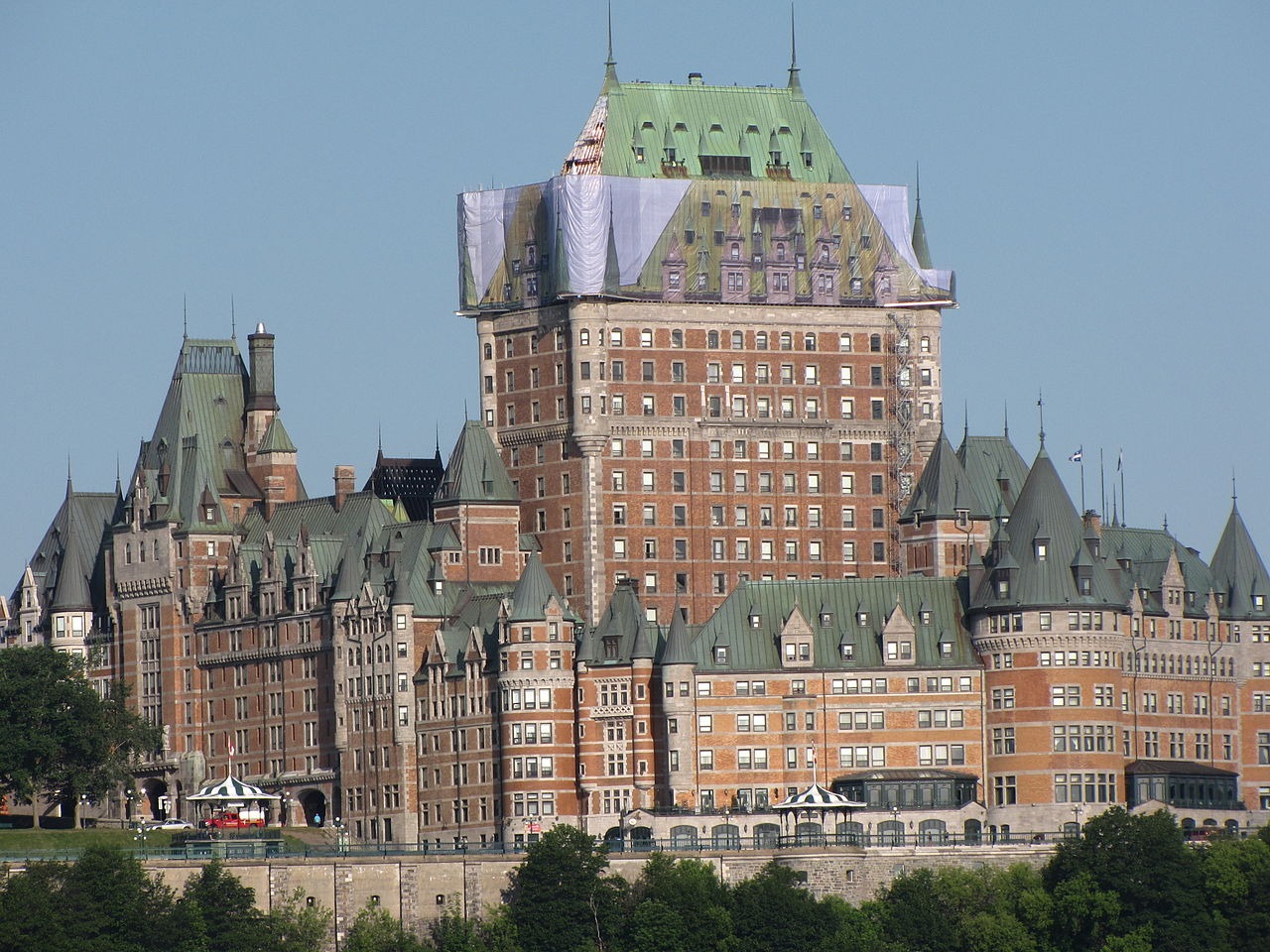 An image of the hotel's roof imposed on safety netting and hung from scaffolding to hide refurbishment work on the hotel in July 2011