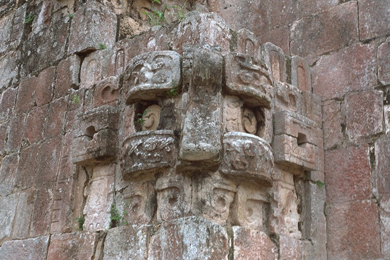 One of the stacked Chaac masks flanking the west staircase