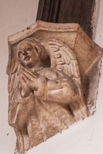 Corbel head of of an angel