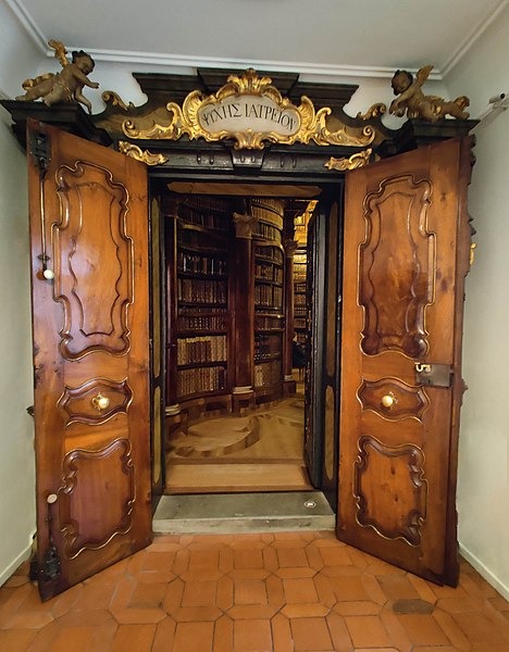 Entrance of the Abbey's library. On top of the entrance there is the Greek inscription: "ΨΥΧΗΣ ΙΑΤΡΕΙΟΝ", meaning "The Healing Place of the Soul".