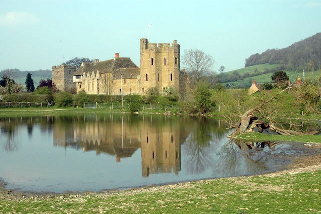 The south tower and the hall range reflected in the castle pond